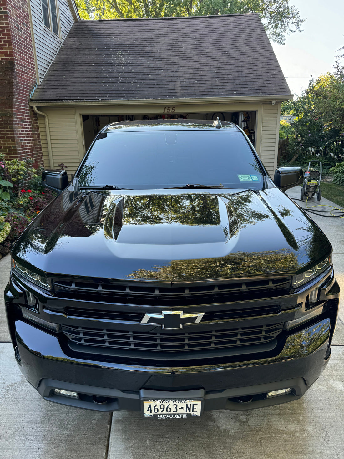 Glossy black paint after ceramic coating application