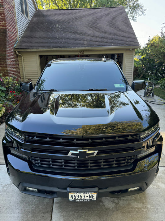 Glossy black paint after ceramic coating application