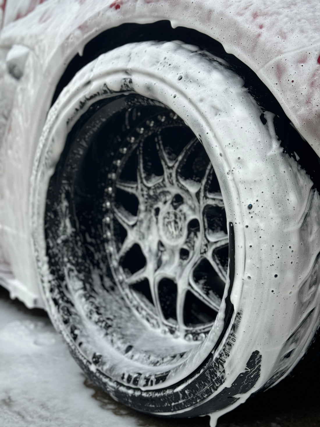 3-Piece wheel covered in soap during a mobile exterior detail