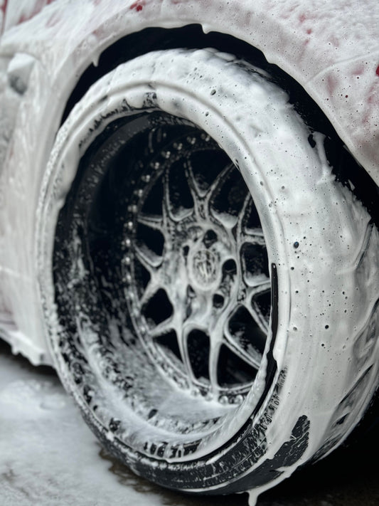 3-Piece wheel covered in soap during a mobile exterior detail