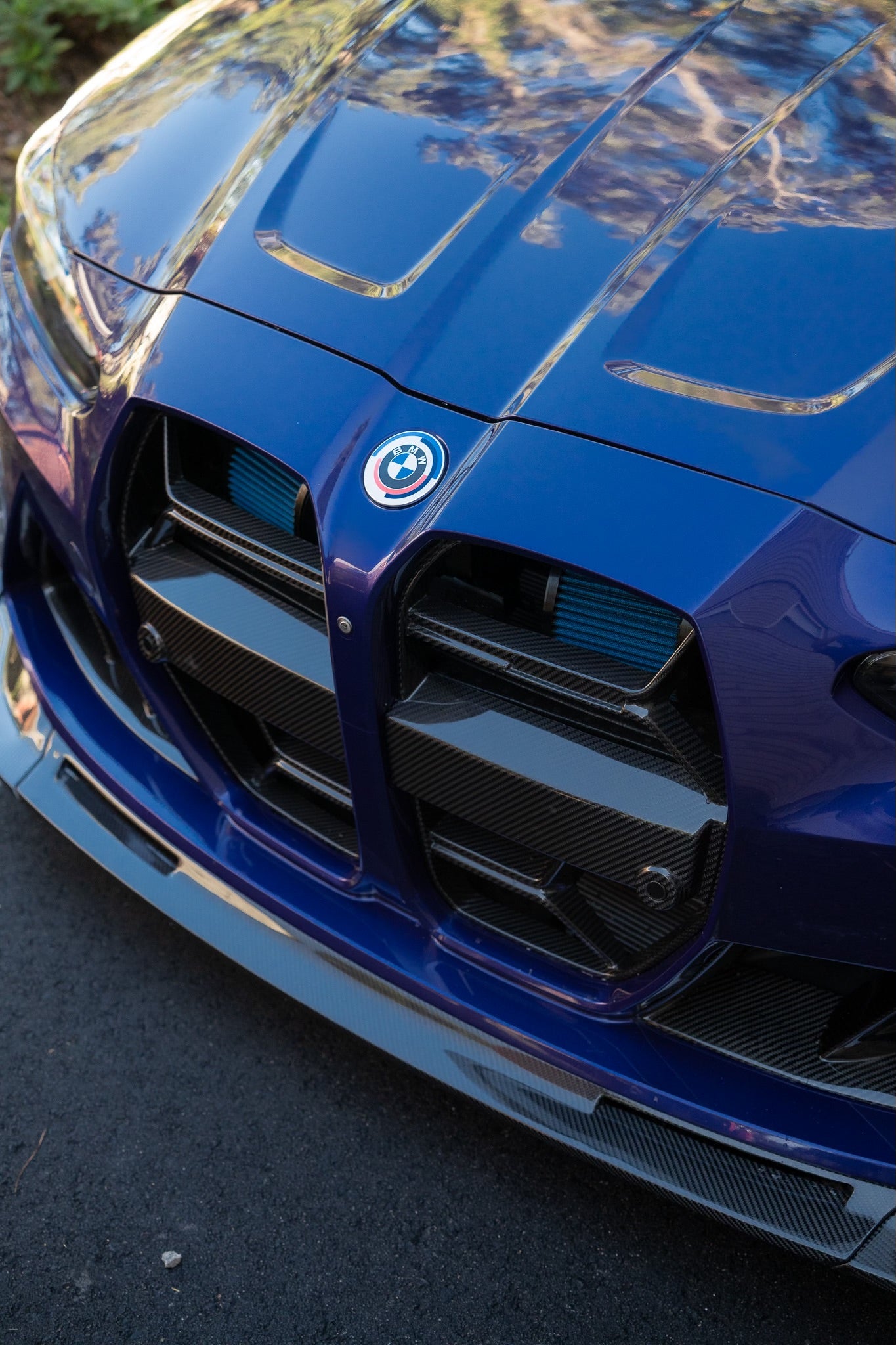 G82 M4 after exterior detail with custom carbon fiber grill and lip.